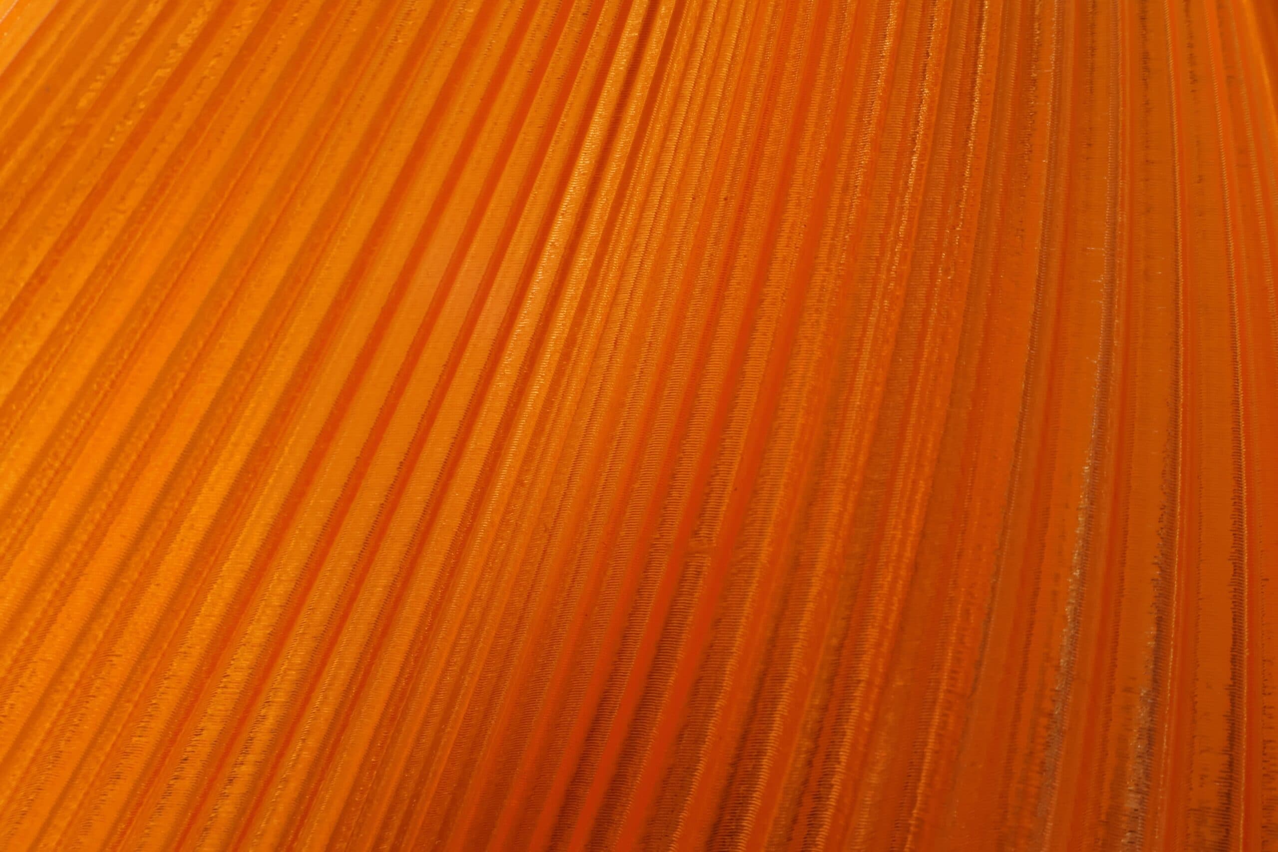 Ingezoomd detail van de oranje tafellamp